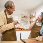asian-happy-senior-elderly-couple-enjoy-cook-food-2021-12-09-15-15-47-utc